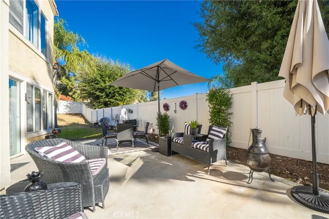 an aerial view of residential houses and outdoor space