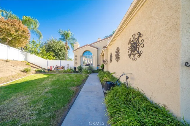 a backyard of a house with seating space