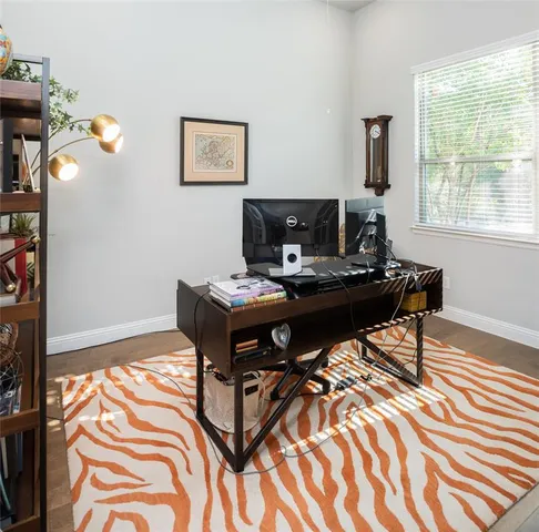 a living room with a couch and a table