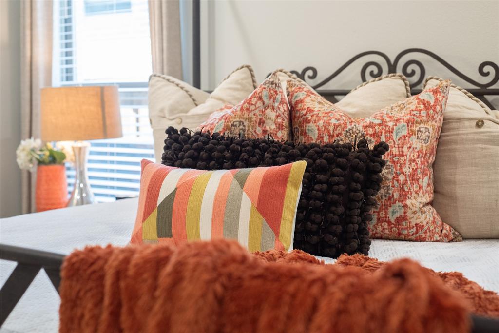 4841 Miles Way Fairview, TX 75069 - Photo 14 of 23 a bedroom with a bed and a painting on the wall