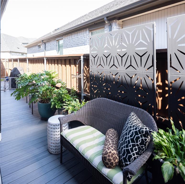 4841 Miles Way Fairview, TX 75069 - Photo 20 of 23 a wooden bench sitting in front of a building