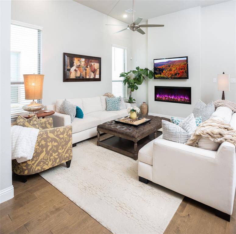 4841 Miles Way Fairview, TX 75069 - Photo 2 of 23 a living room with furniture and painting on the wall