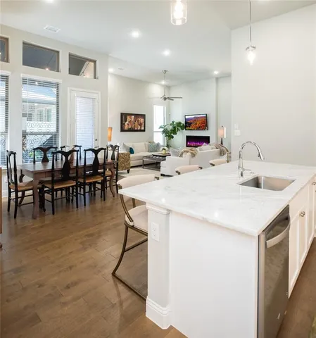 a view of kitchen dining table and chairs