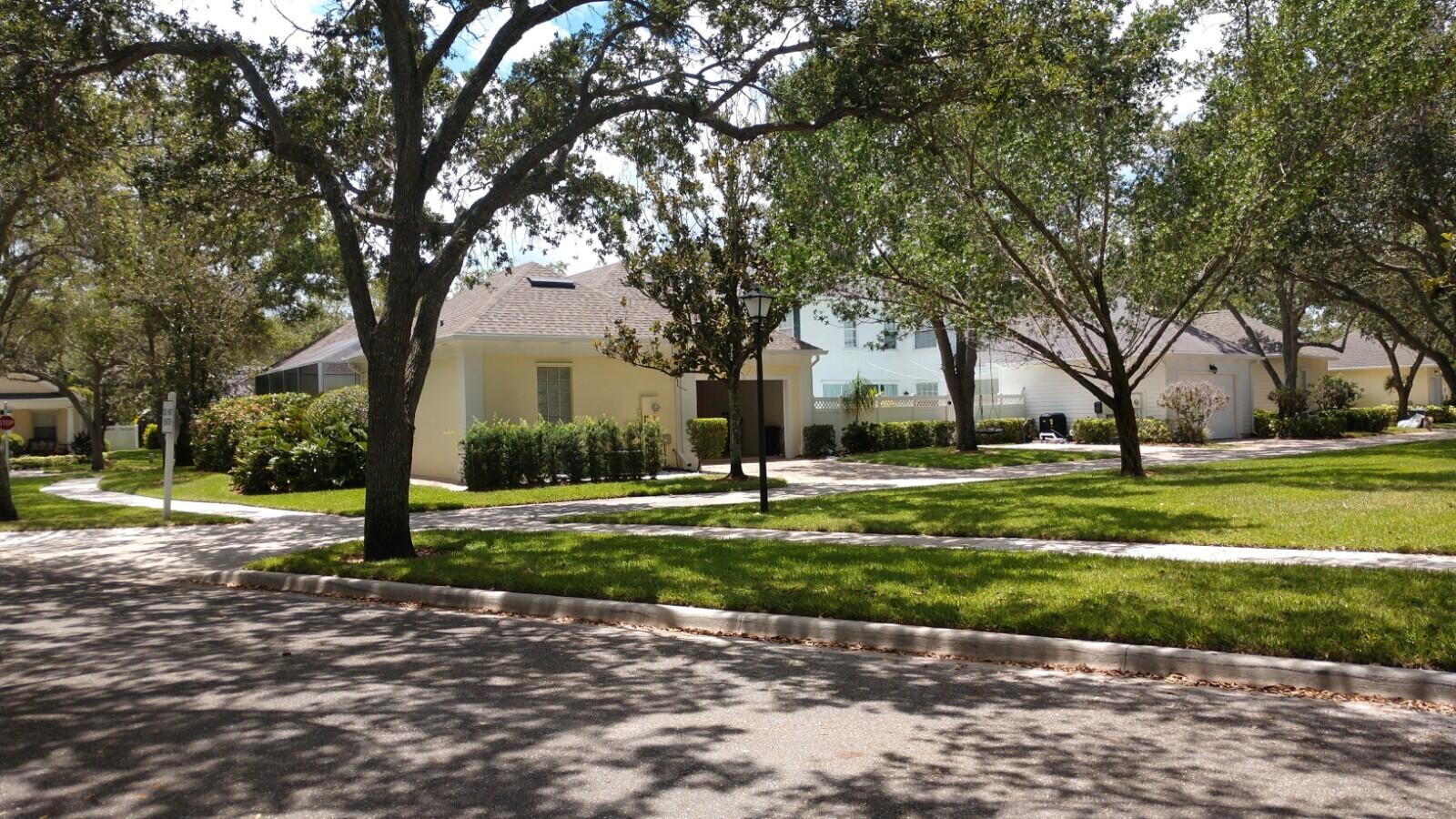 307 Sweet Bay Circle Jupiter, FL 33458 - Photo 20 of 21 Alley for garage entrance