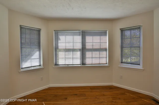 a kitchen with a stove a sink and a refrigerator