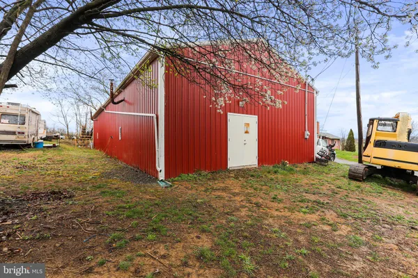 a view of a backyard of a house