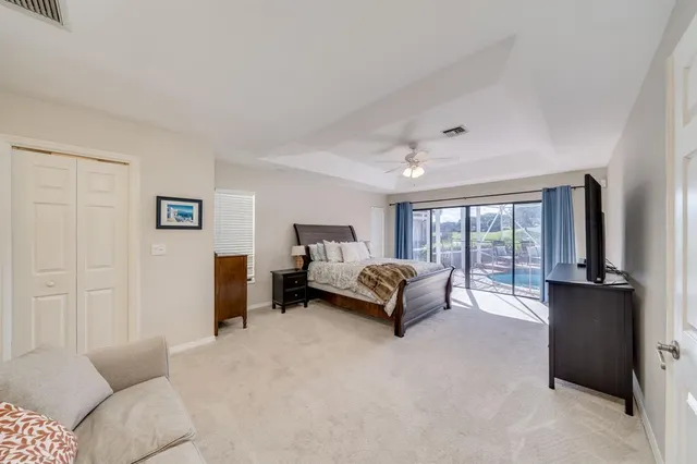 a bathroom with a tub a sink a mirror and a shower