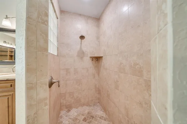 a view of a workspace with furniture and white walls