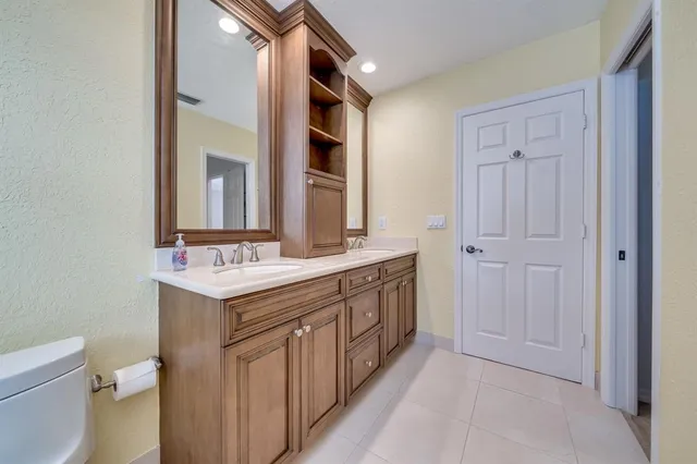 a outdoor living space with patio furniture and garden view