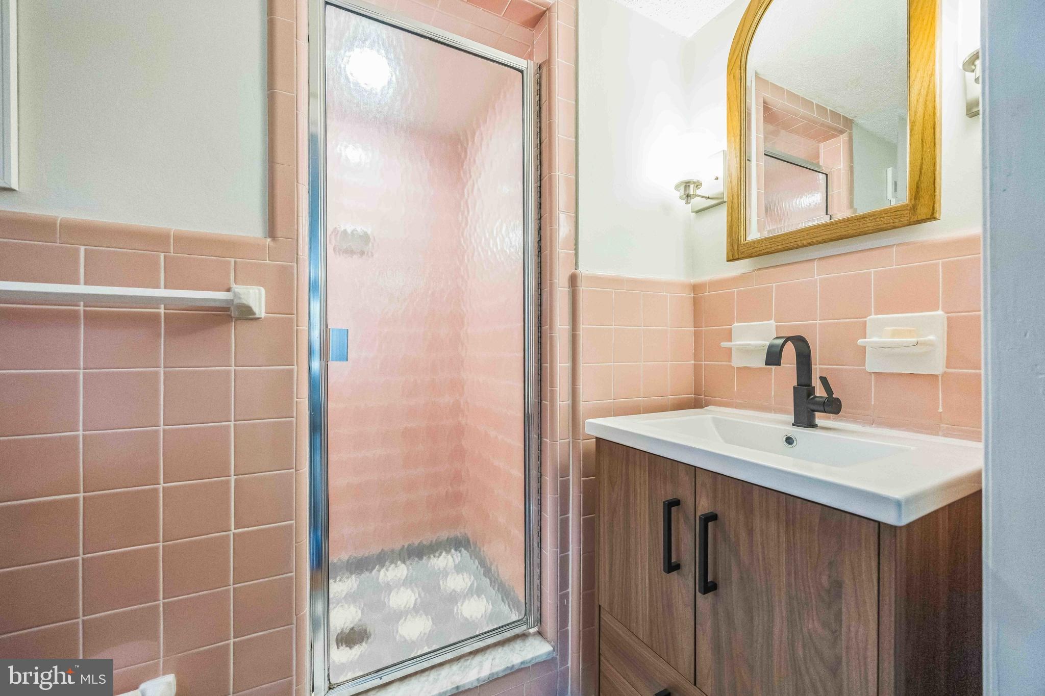 727 Hemlock Road Media, PA 19063 - Photo 28 of 37 a bathroom with a sink and a mirror