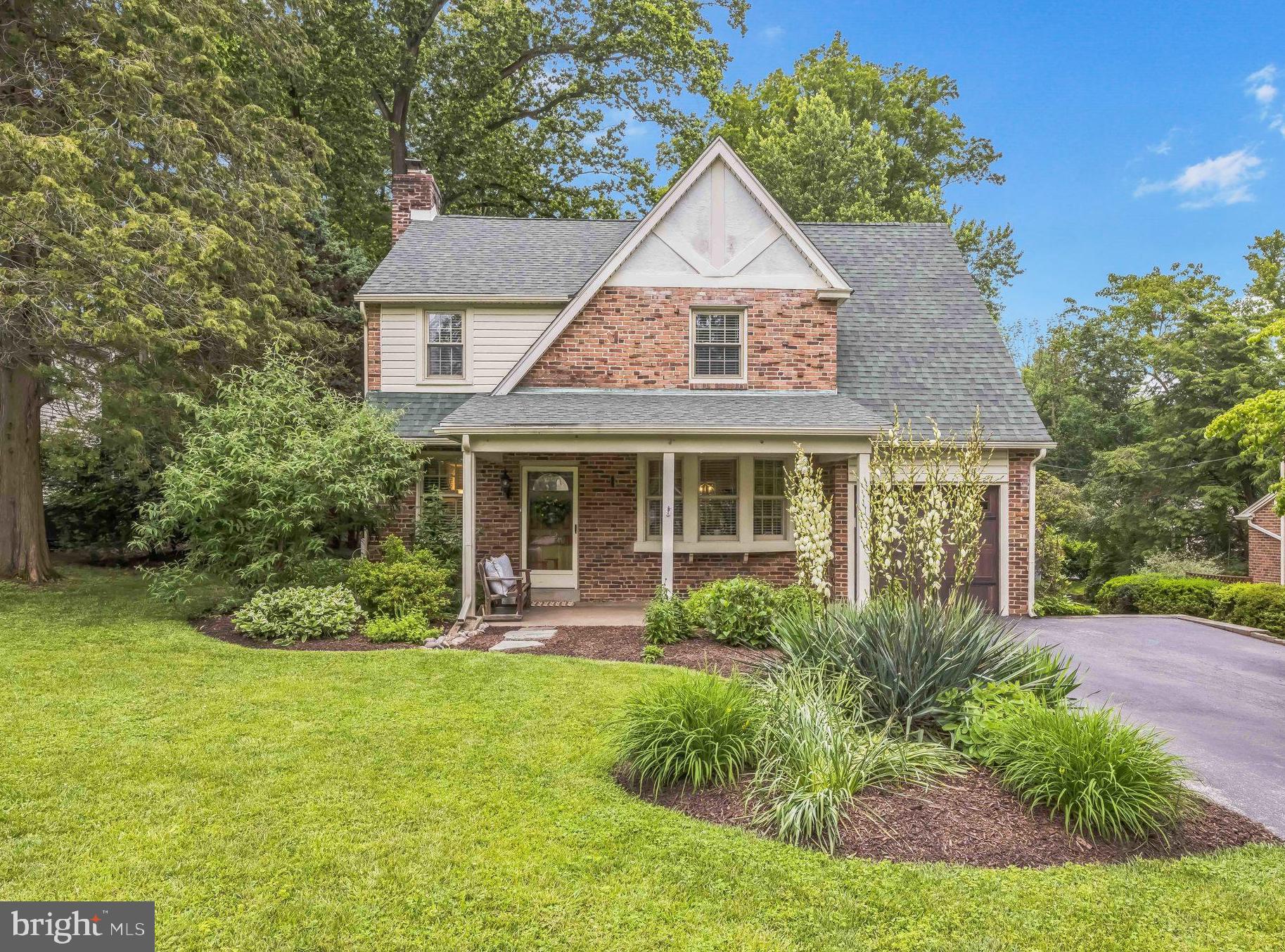 727 Hemlock Road Media, PA 19063 - Photo 3 of 37 front view of a house with a yard