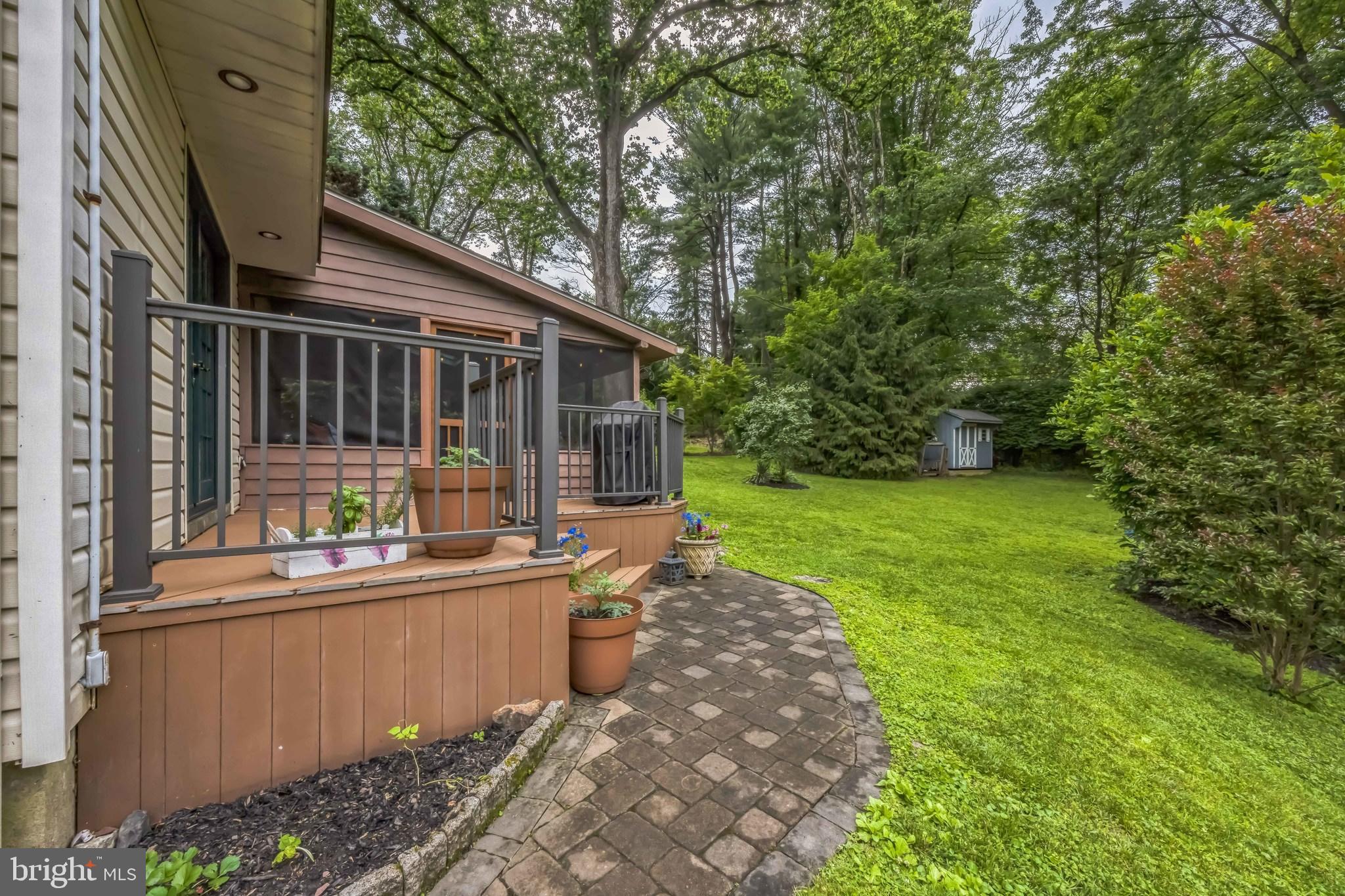 727 Hemlock Road Media, PA 19063 - Photo 34 of 37 a view of a house with backyard and garden