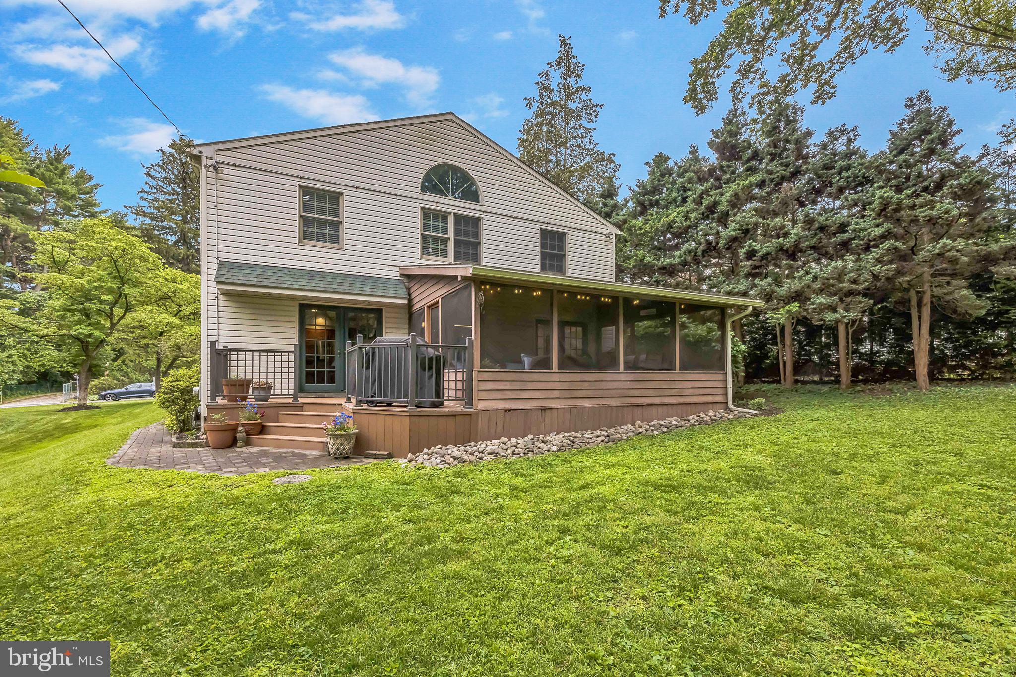 727 Hemlock Road Media, PA 19063 - Photo 4 of 37 a front view of a house with a yard