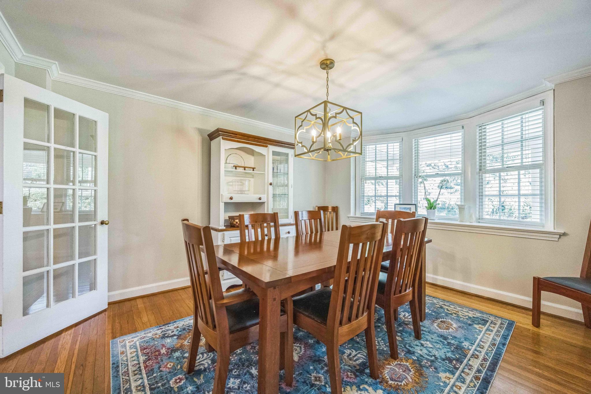 727 Hemlock Road Media, PA 19063 - Photo 9 of 37 a view of a dining room with furniture window and wooden floor