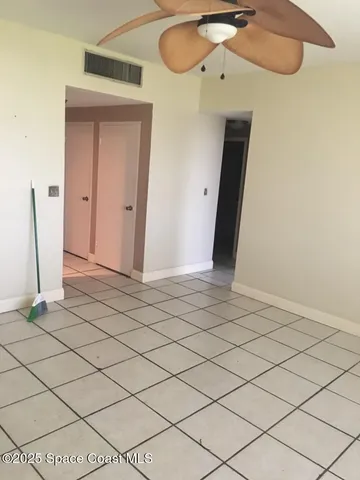 a view of a livingroom with wooden floor