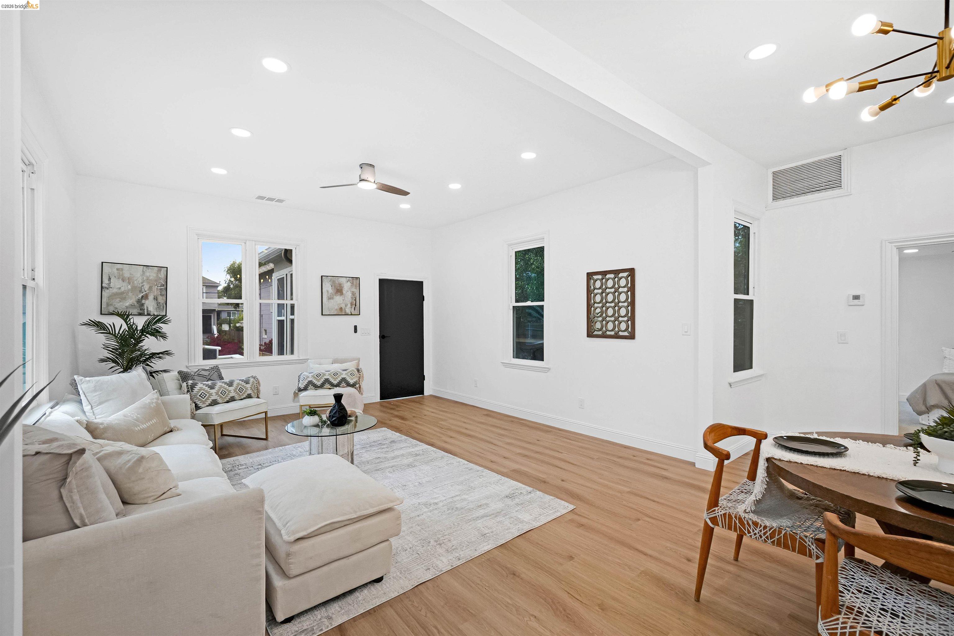 1812 Woolsey Street Berkeley, CA 94703 - Photo 7 of 48 Open-concept living space featuring wood-finish flooring, recessed lighting, and a contemporary ceiling fan