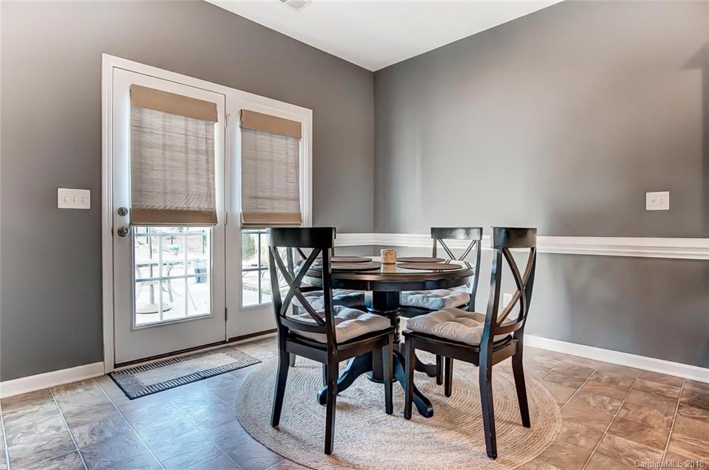 79297 Ridgehaven Road Lancaster, SC 29720 - Photo 19 of 36 a view of a dining room with furniture and window