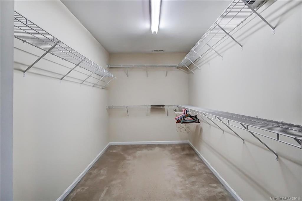 79297 Ridgehaven Road Lancaster, SC 29720 - Photo 25 of 36 a view of a storage and utility room with racks on the wall