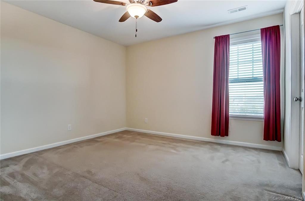 79297 Ridgehaven Road Lancaster, SC 29720 - Photo 31 of 36 a view of an empty room with a window