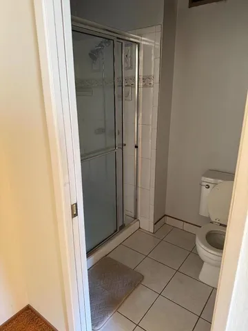 a view of a patio with swimming pool