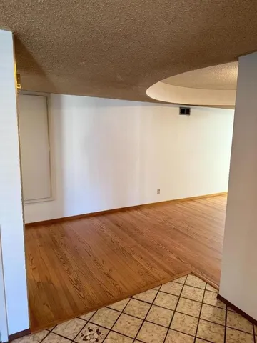 a kitchen with sink cabinets and window