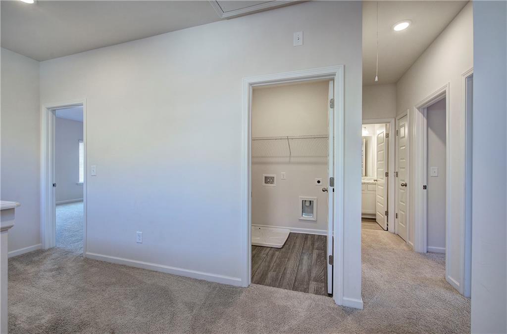 509 Alma Street Cartersville, GA 30121 - Photo 19 of 39 wooden floor and closet in a bathroom