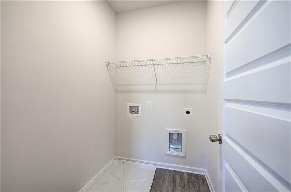 509 Alma Street Cartersville, GA 30121 - Photo 20 of 39 a view of small space with racks on the wall
