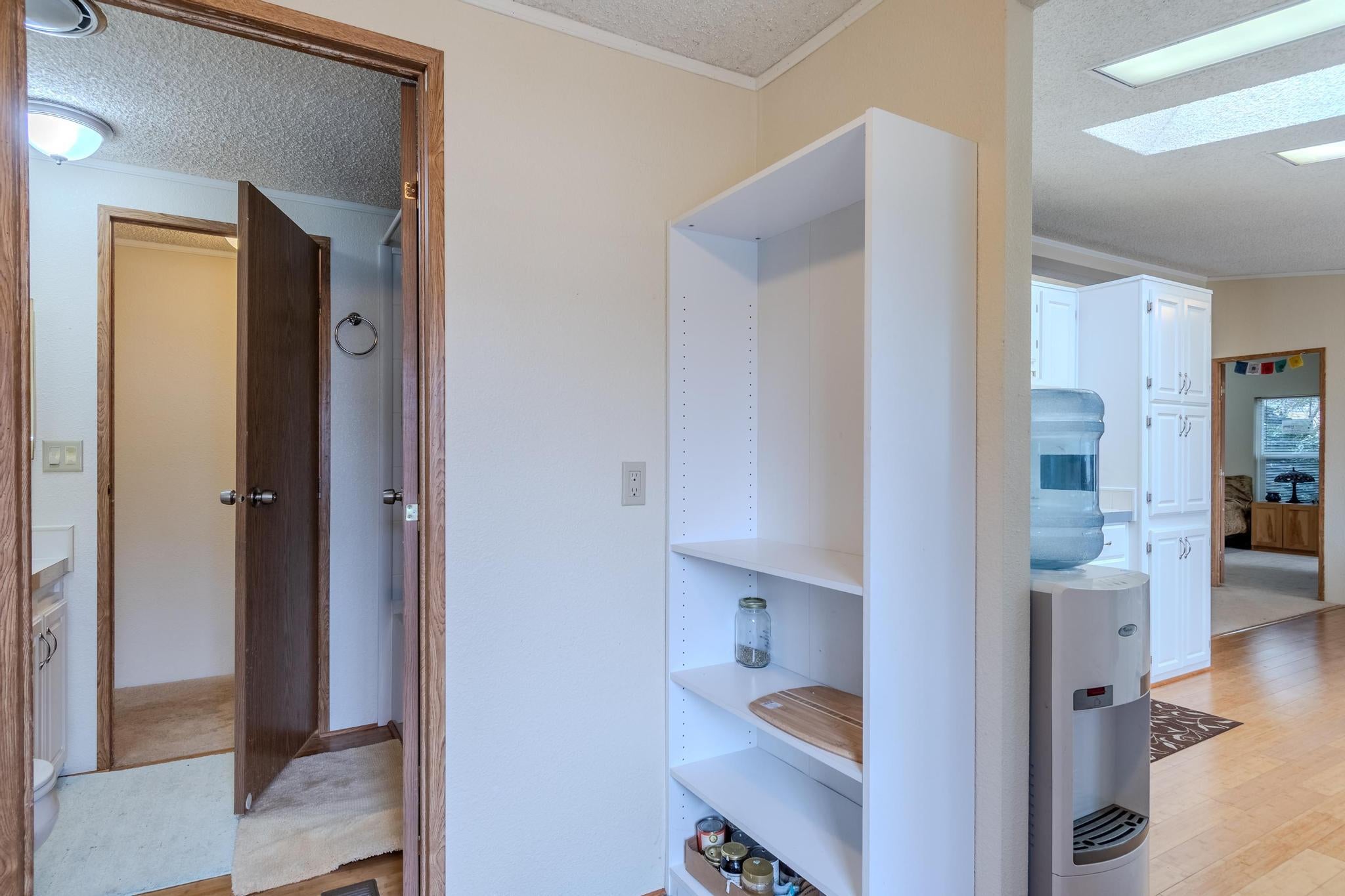 939 South Valley View Road, Unit 19 Ashland, OR 97520 - Photo 12 of 26 Laundry to 2nd bath