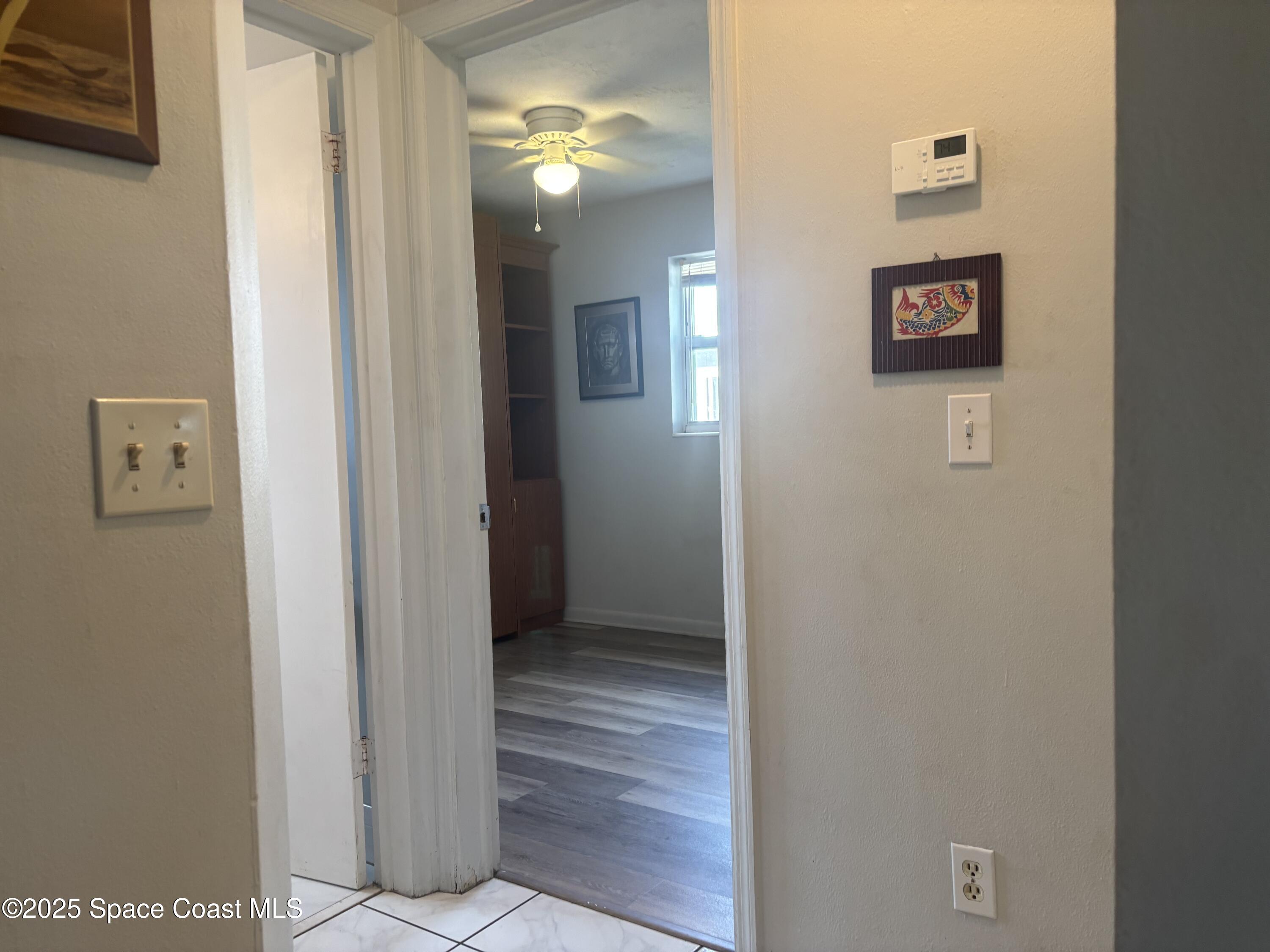 986 Macco Road Cocoa, FL 32927 - Photo 12 of 18 a view of a hallway with front door