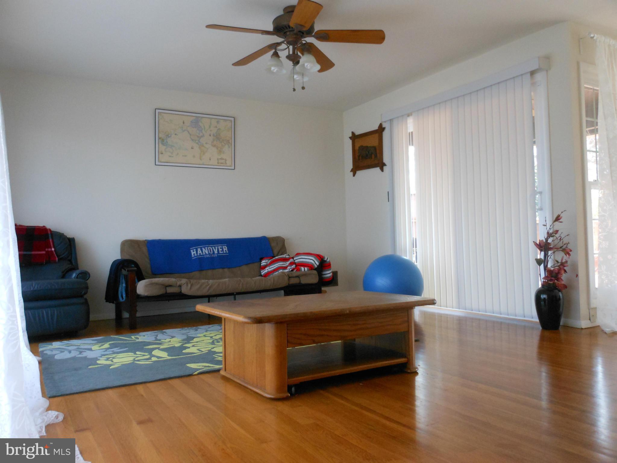 4306 Emden Street Silver Spring, MD 20906 - Photo 11 of 23 a living room with furniture and wooden floor