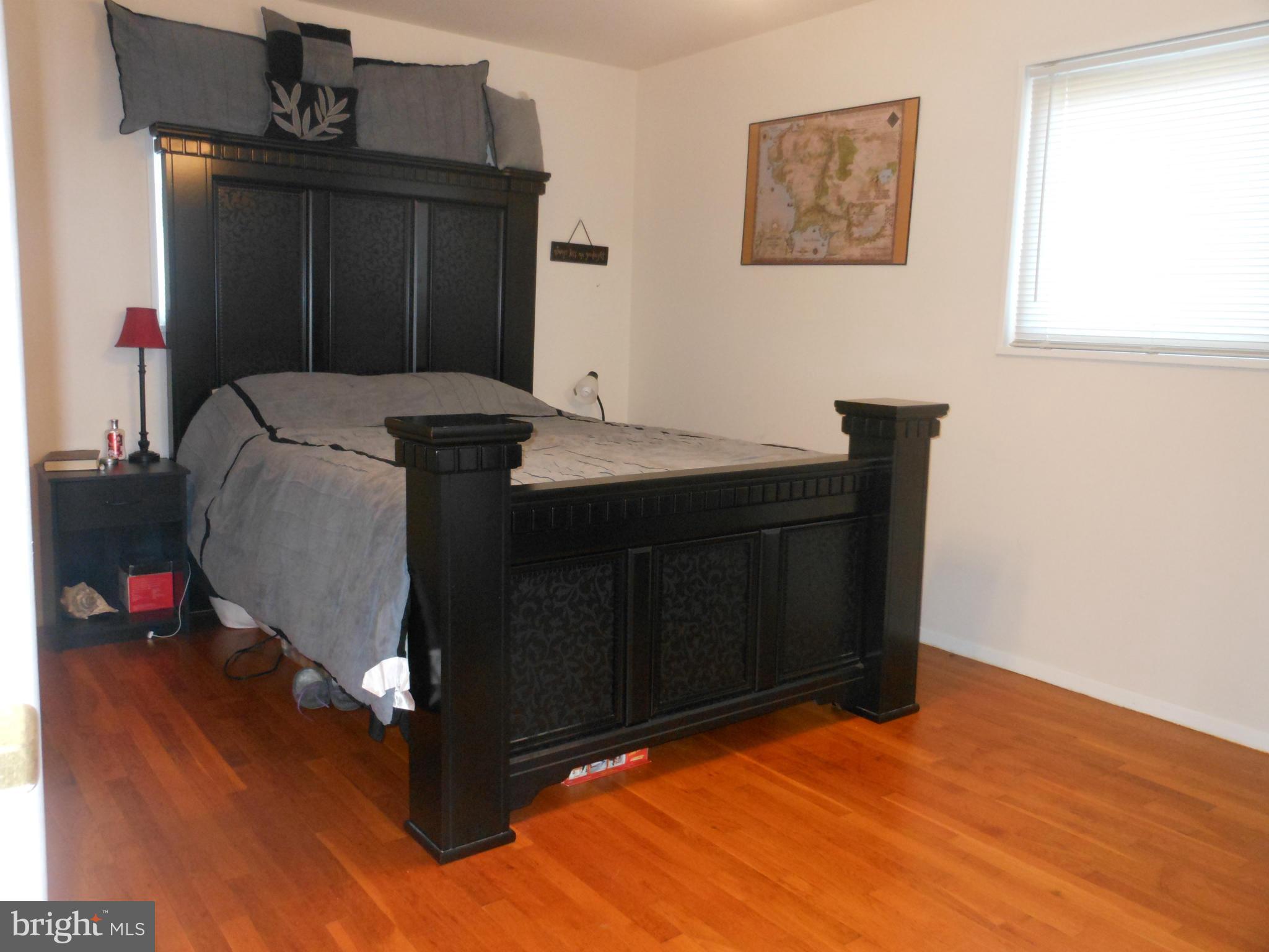 4306 Emden Street Silver Spring, MD 20906 - Photo 14 of 23 a living room with a wooden floor