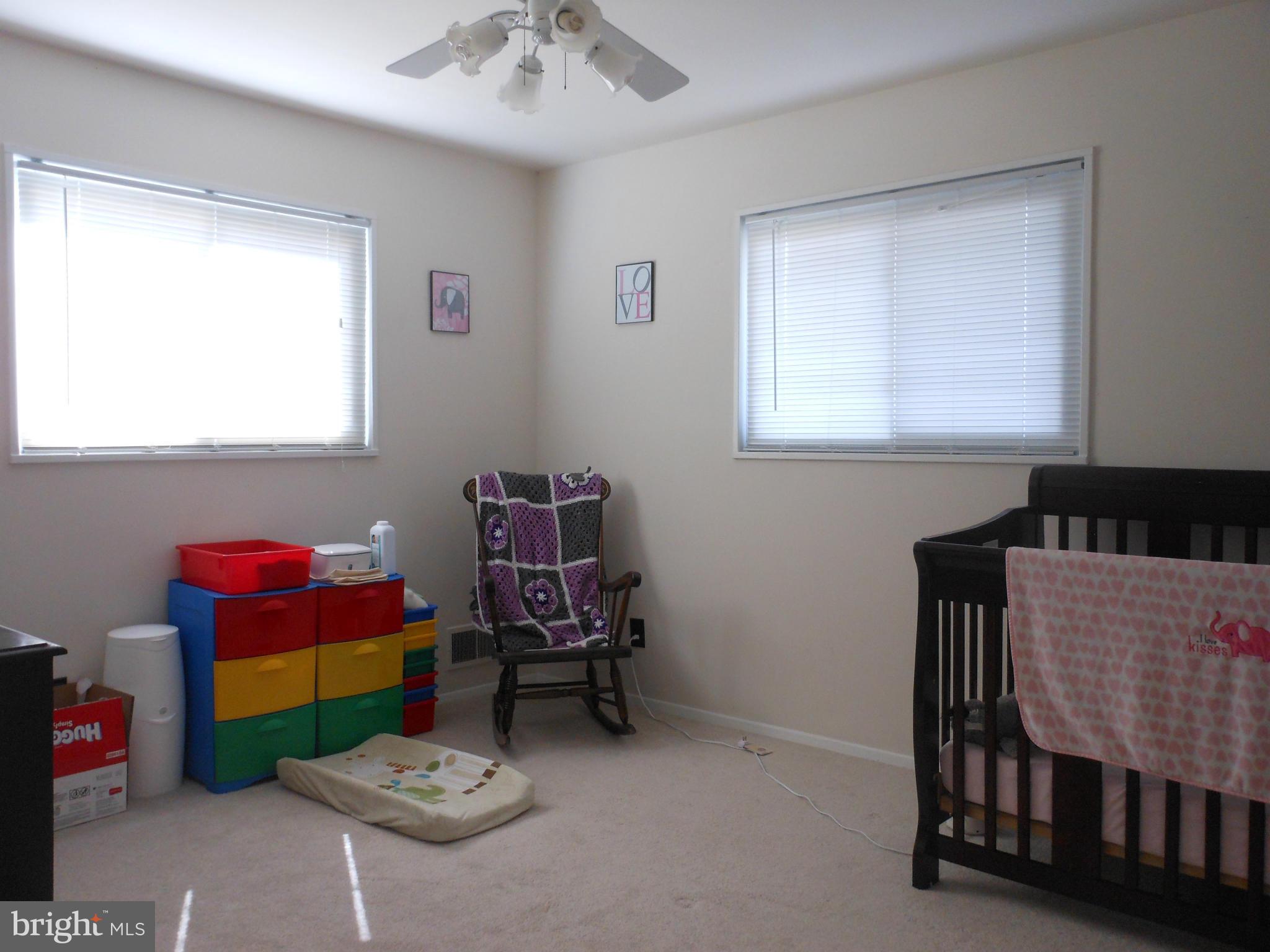 4306 Emden Street Silver Spring, MD 20906 - Photo 18 of 23 a living room with furniture and a window