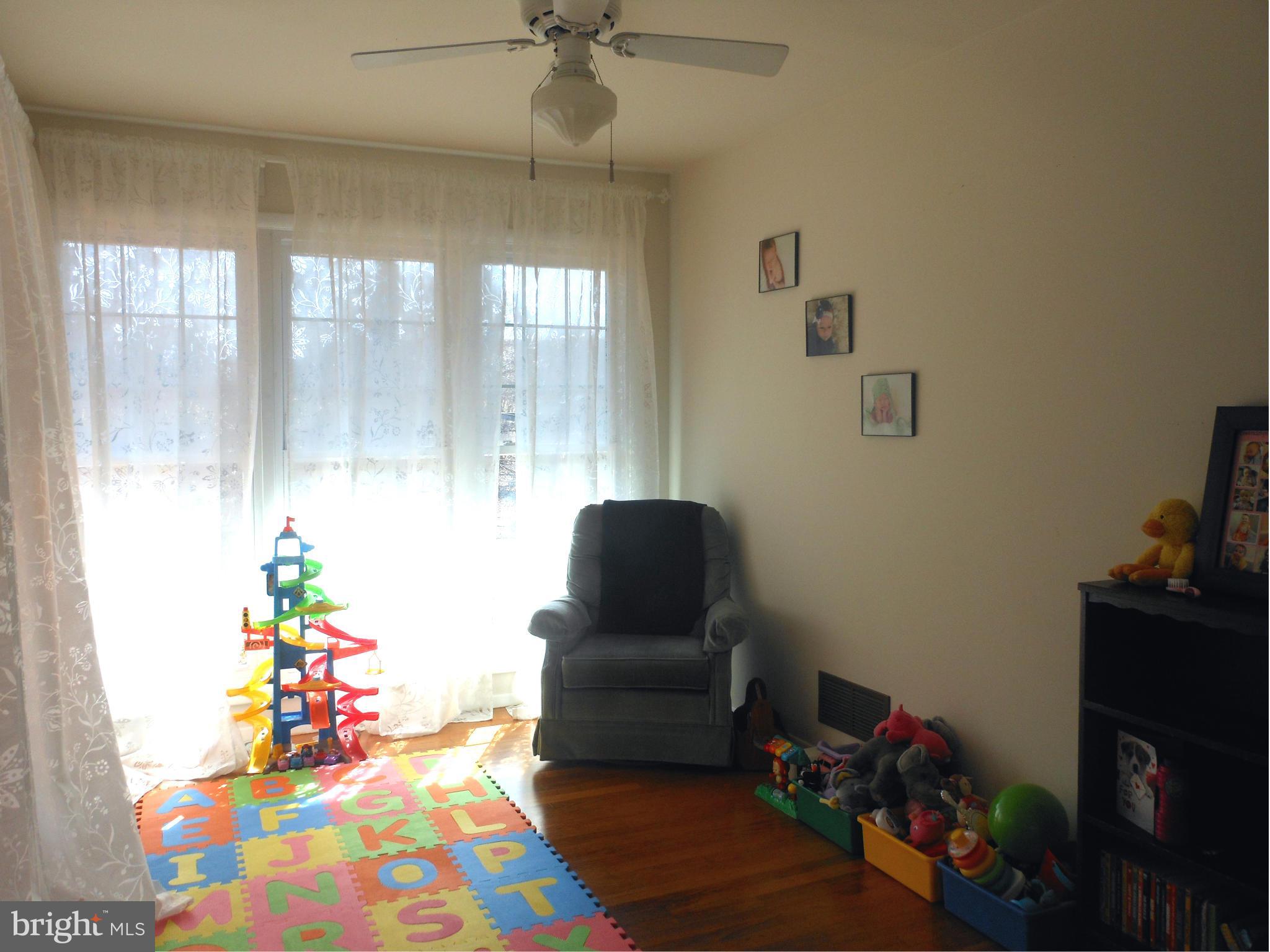 4306 Emden Street Silver Spring, MD 20906 - Photo 19 of 23 a living room with furniture and a window