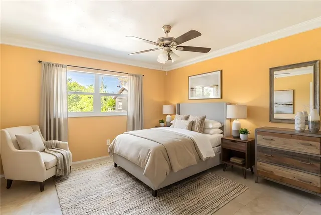 a bedroom with a bed and a couch