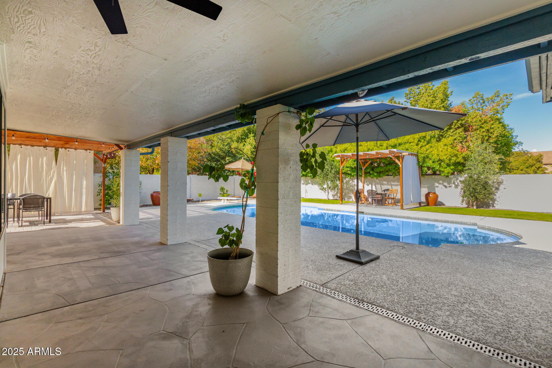 1948 East Jeanine Drive Tempe, AZ 85284 - Photo 15 of 45 a house view with a garden space