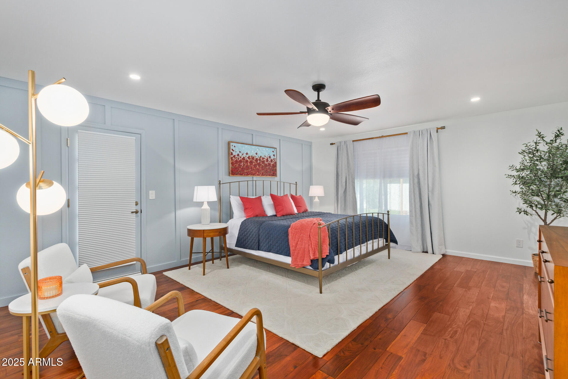 1948 East Jeanine Drive Tempe, AZ 85284 - Photo 17 of 45 a bedroom with a bed and a chandelier