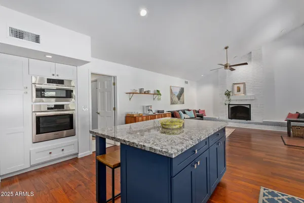a kitchen with sink cabinets and counter top space