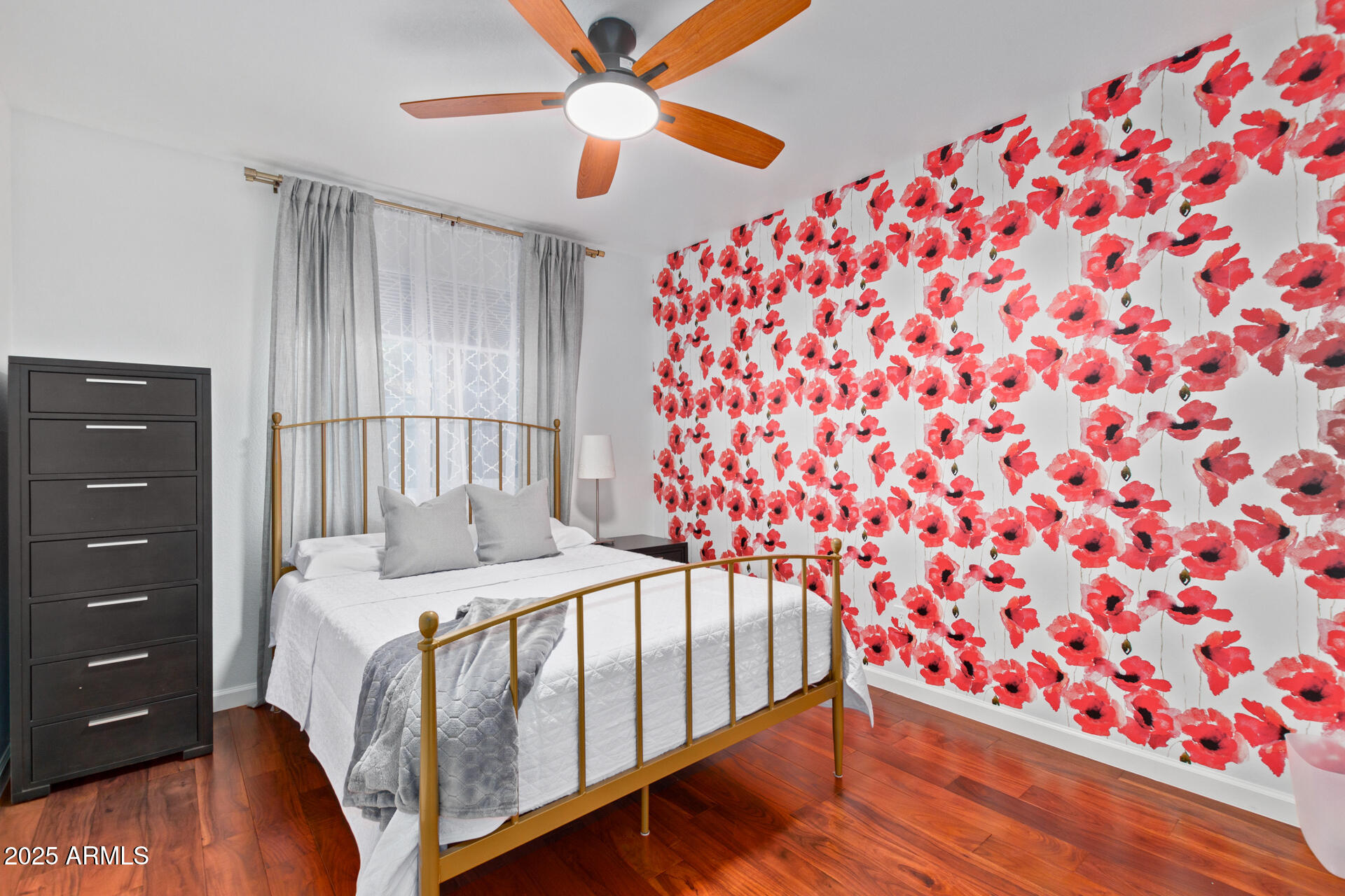 1948 East Jeanine Drive Tempe, AZ 85284 - Photo 41 of 45 a bedroom with a bed and a chandelier