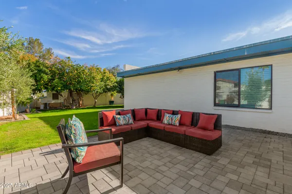 a outdoor living space with furniture and garden