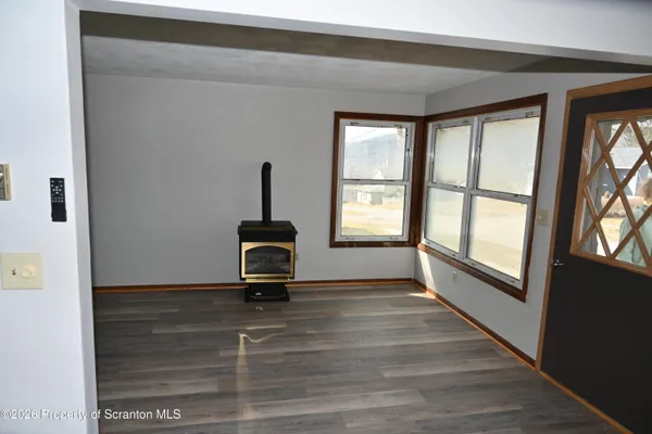 a view of a room with a window