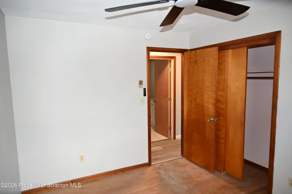 an empty room with a door