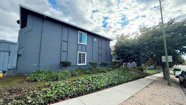 a backyard of a house with lots of green space