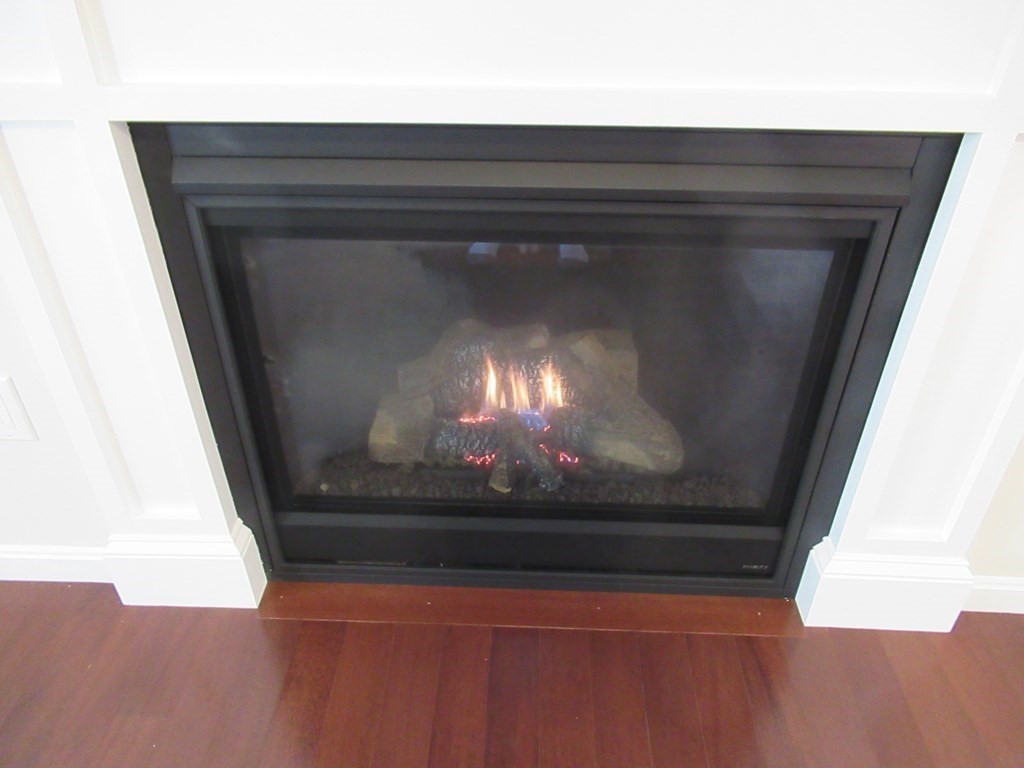 16 Farnum Street Uxbridge, MA 01569 - Photo 13 of 27 a close view of fireplace