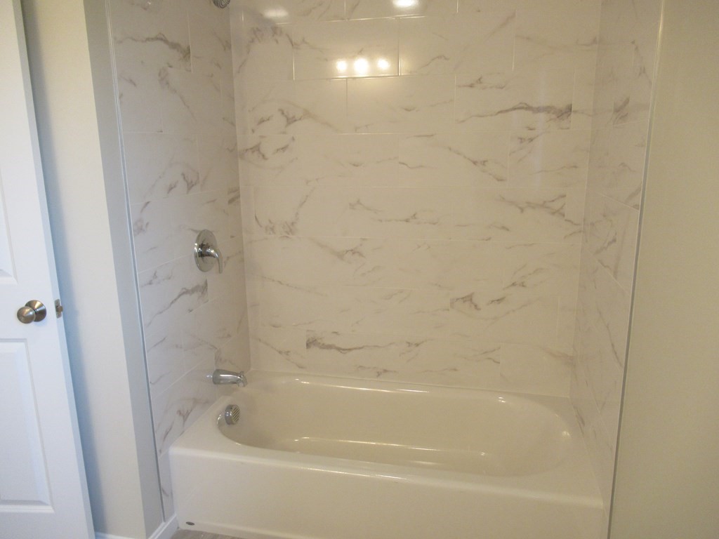 16 Farnum Street Uxbridge, MA 01569 - Photo 19 of 27 a bathroom with a bathtub