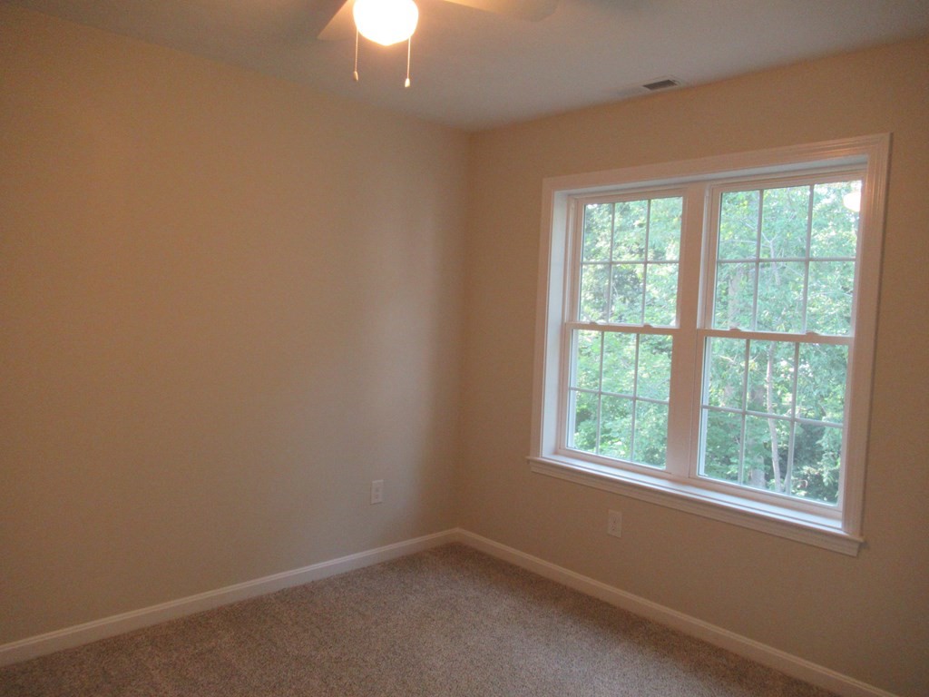 16 Farnum Street Uxbridge, MA 01569 - Photo 20 of 27 an empty room with a window