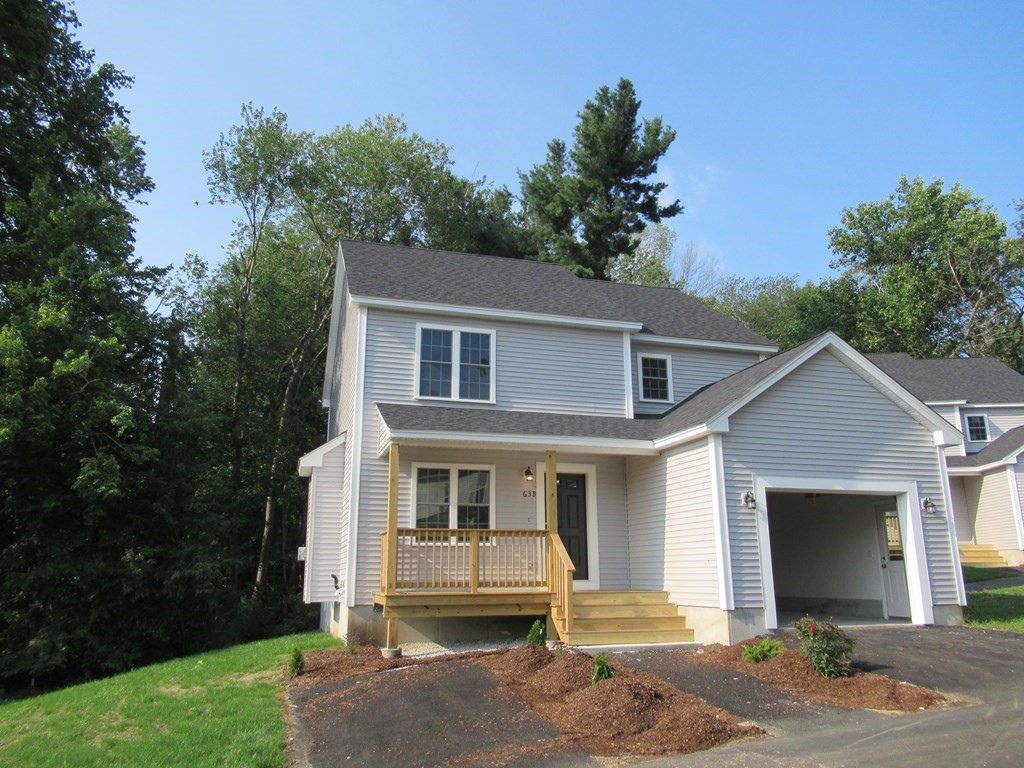 16 Farnum Street Uxbridge, MA 01569 - Photo 2 of 27 a front view of a house with a yard
