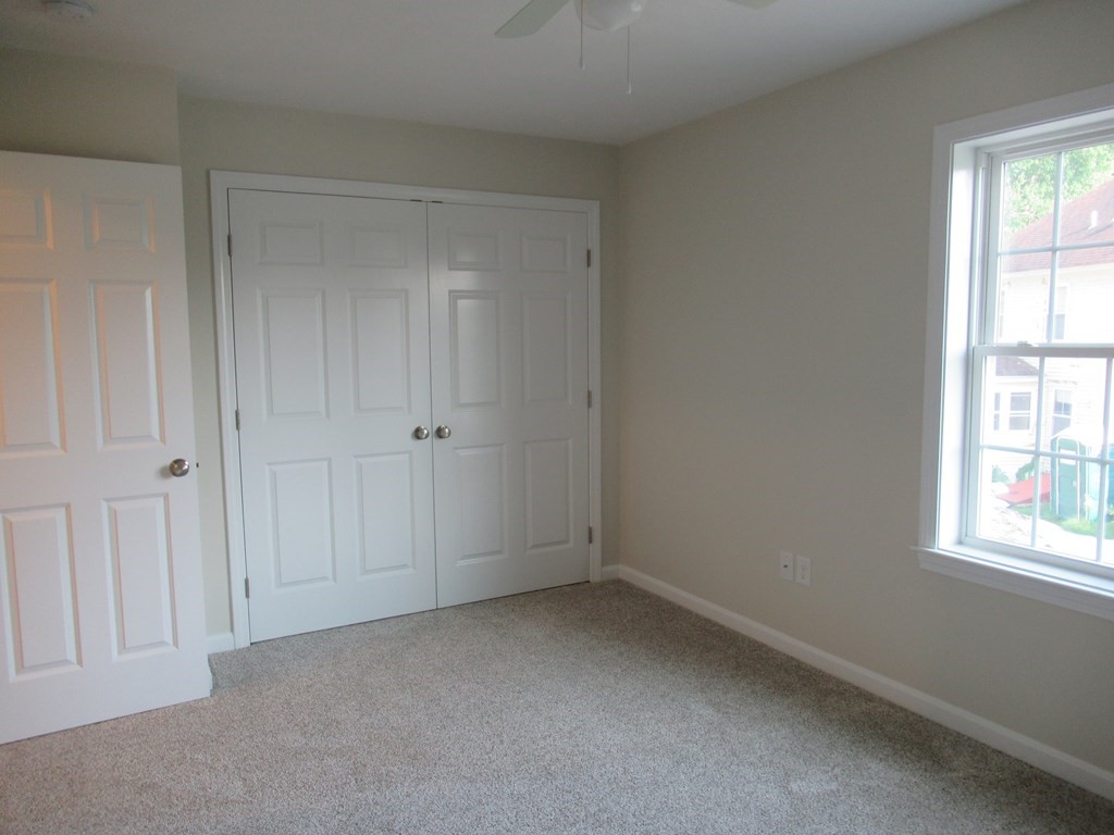 16 Farnum Street Uxbridge, MA 01569 - Photo 24 of 27 an empty room with windows