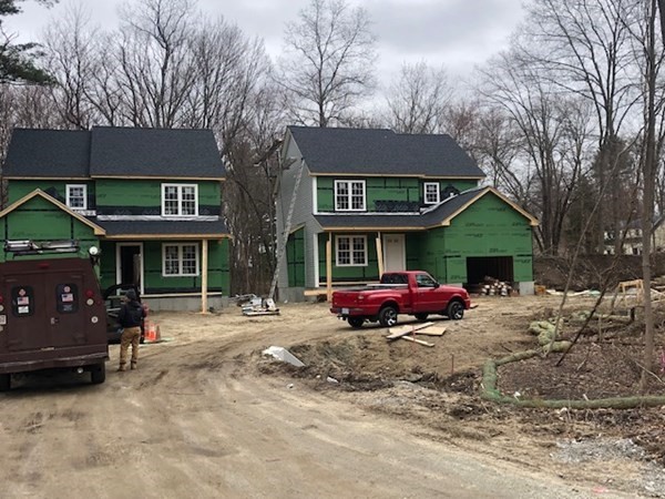 16 Farnum Street Uxbridge, MA 01569 - Photo 27 of 27 a front view of a building with parking space
