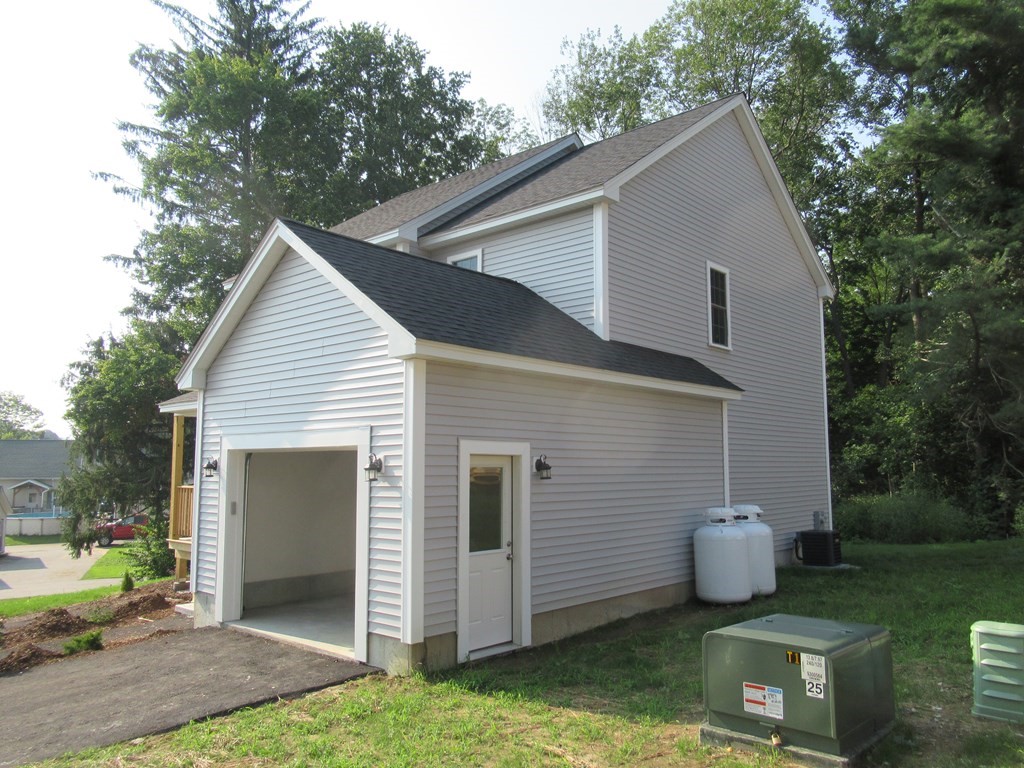 16 Farnum Street Uxbridge, MA 01569 - Photo 3 of 27 a view of a house with backyard
