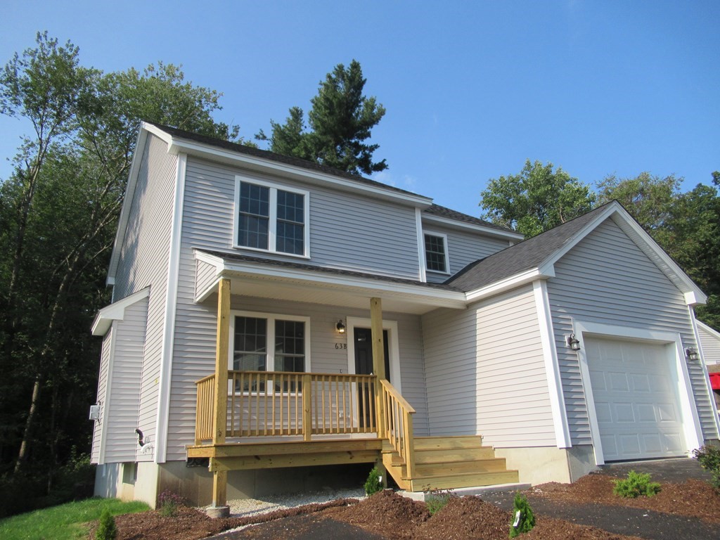 16 Farnum Street Uxbridge, MA 01569 - Photo 7 of 27 a front view of a house with a garden